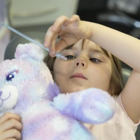 Child holding the wand